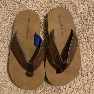 Leather Hannah Anderson flip flops.